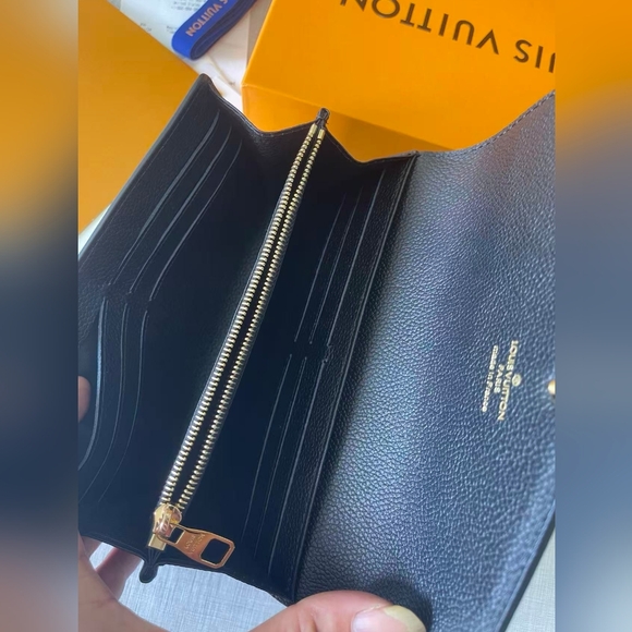 LOUIS VUITTON Monogram Empreinte Leather Sarah Wallet - Picture 10 of 11